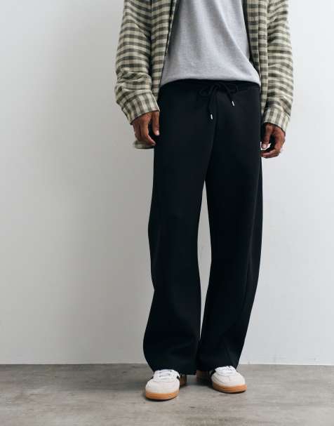 ASOS DESIGN cocoon fit joggers with displaced seams in black - view 1