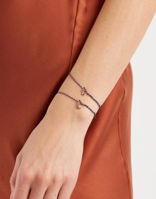 ASOS DESIGN - Coffret cadeau avec lot de deux bracelets en corde et perles et breloques célestes - Doré-Bleu