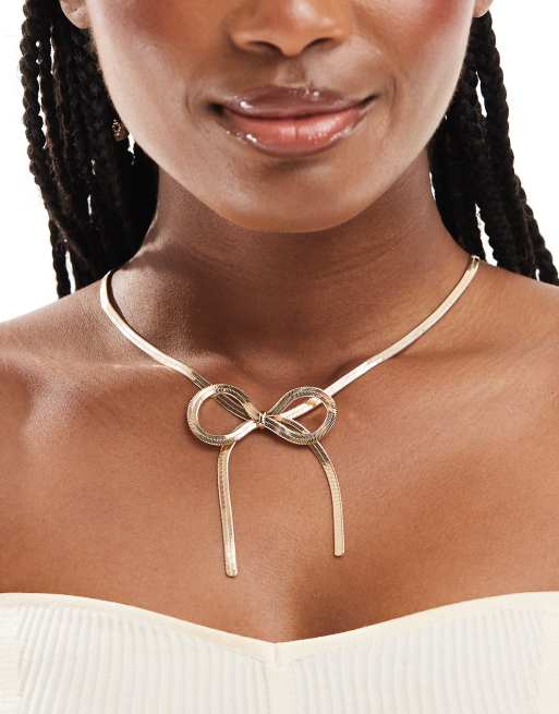 ASOS DESIGN- Collana color oro con catena snake e fiocco