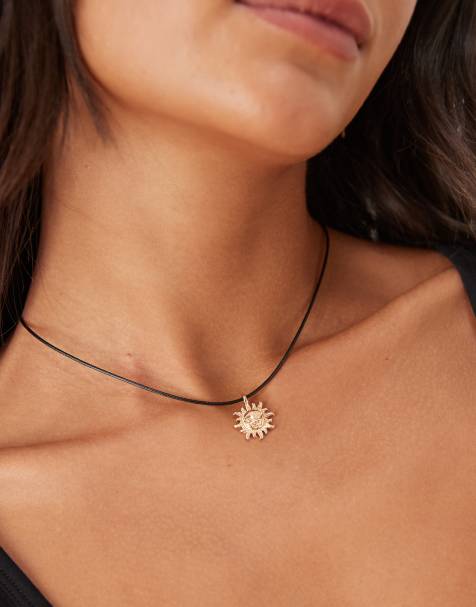 ASOS DESIGN - Collana con cordoncino con piccolo ciondolo dorato a forma di sole - view 1
