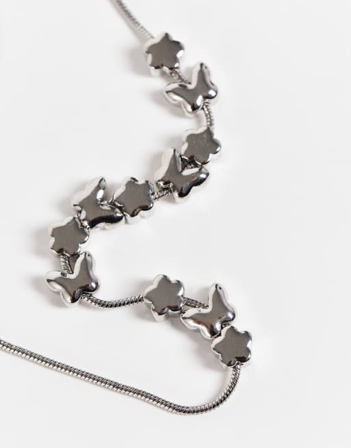 ASOS DESIGN - Collana con perline a forma di farfalle e fiori in metallo color argento