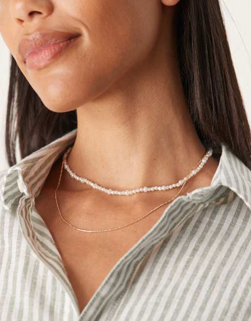 ASOS DESIGN - Collana corta multifilo con catenina color oro e perle sintetiche