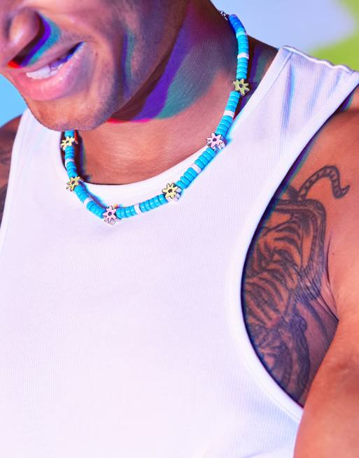 ASOS DESIGN - Collana da festival con perline blu e a fiori smaltati  