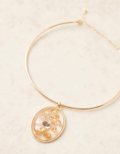 ASOS DESIGN - Collana dorata sottile con ciondolo con fiori all'interno, 2 di 3