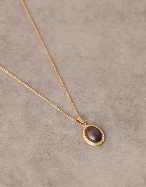ASOS DESIGN - Collana in acciaio inossidabile dorata con pendente a pietra semipreziosa