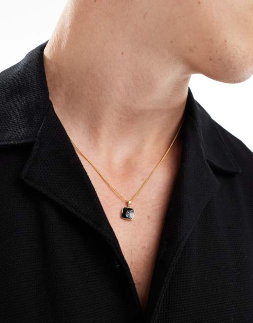 ASOS DESIGN - Collana in argento sterling placcato in oro 14 kt con ciondolo nero