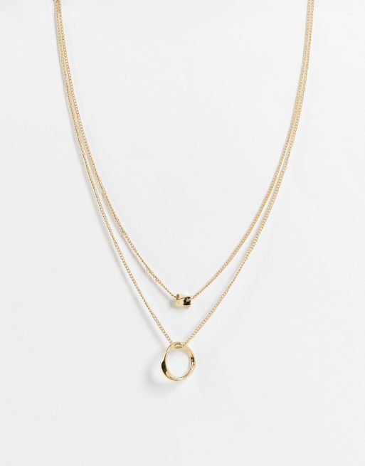 ASOS DESIGN - Collana multifilo color oro con ciondolo a perlina e a cerchio