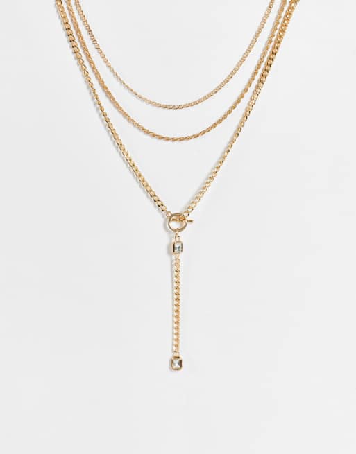 ASOS DESIGN - Collana multifilo color oro con motivo stile lazo