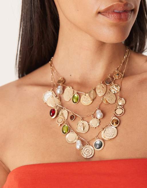 ASOS DESIGN - Collana multifilo con perle sintetiche, pietre e ciondoli color oro