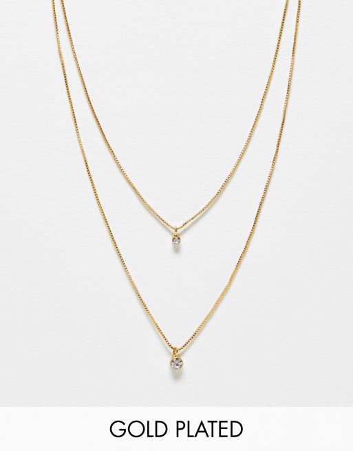 ASOS DESIGN - Collana multifilo placcata in oro 14 ct con pendente con cristallo 