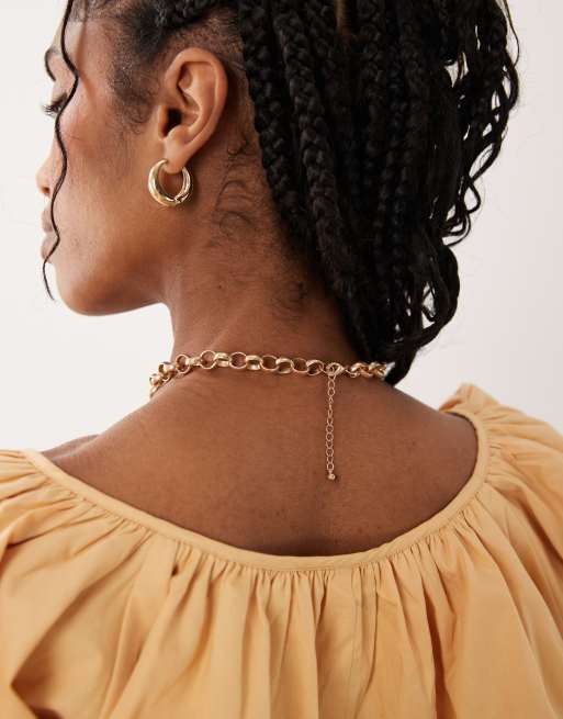 ASOS DESIGN - Collana tonalità oro spazzolato con catena spessa e ciondolo a forma di sole, 3 di 4