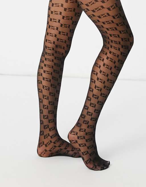 ASOS DESIGN - Collant con monogramma A neri