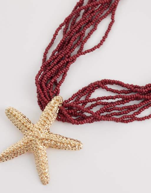 ASOS DESIGN - Collar dorado de varias hileras con cuentas burdeos y colgante de estrella de mar, 4 de 4