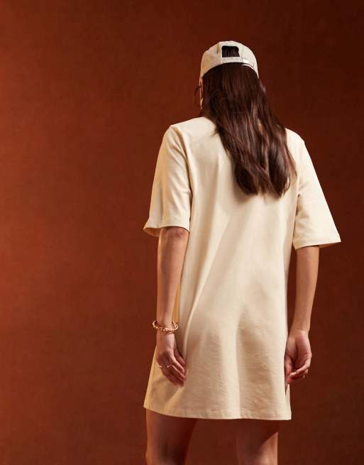 ASOS DESIGN collared placket mini polo dress in buttermilk pique, 2 of 5