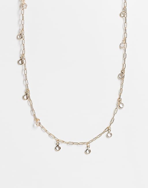 ASOS DESIGN - Collarino color oro con ciondoli con cristalli