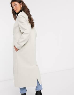 cream collarless coat