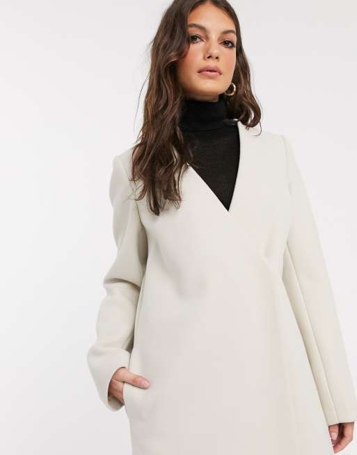 ASOS DESIGN collarless belted coat in cream