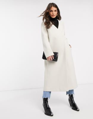 cream collarless coat