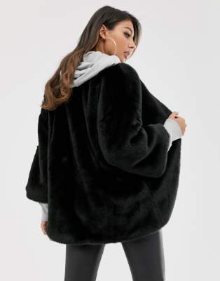 black collarless fur jacket