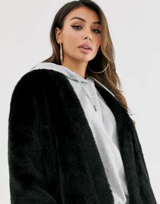 black collarless fur jacket