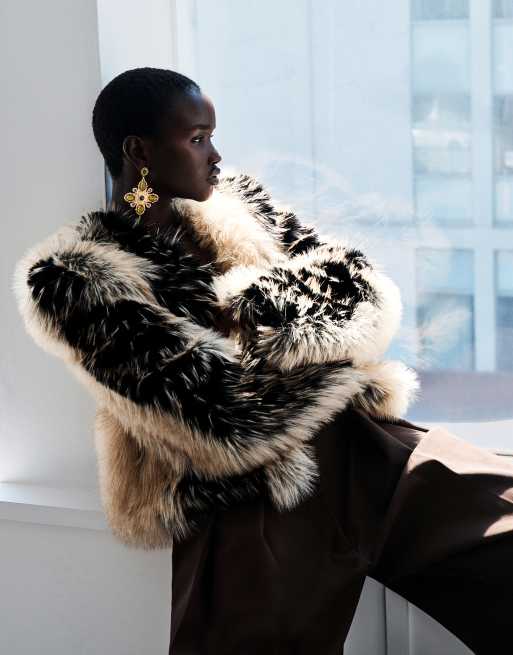 ASOS DESIGN collarless patched faux fur feathered jacket in black and white, 2 of 3