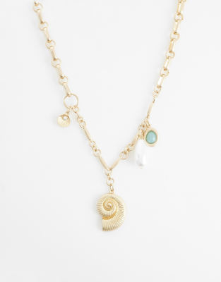 ASOS DESIGN - Collier asymétrique orné de breloques océan - Doré