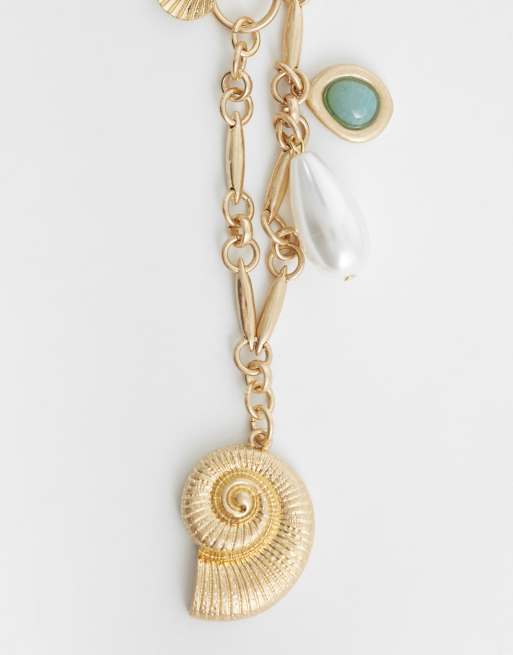 ASOS DESIGN - Collier asymétrique orné de breloques océan - Doré, 4 de 4