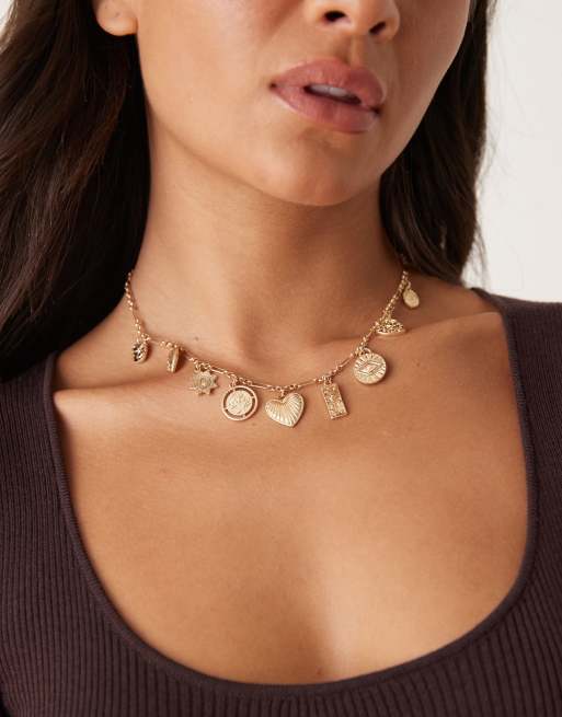 ASOS DESIGN - Collier chaîne à petites breloques - Doré