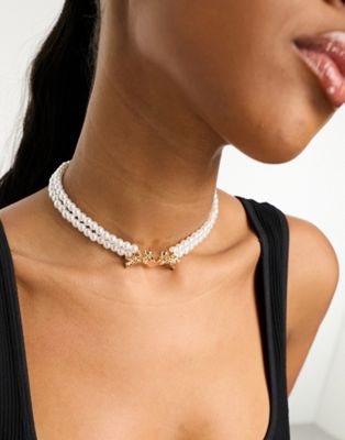 ASOS DESIGN faux pearl short necklace with cherub and heart design - ASOS Price Checker
