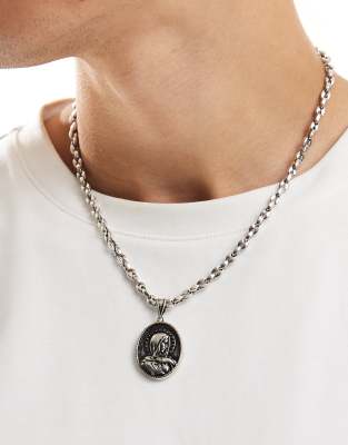 ASOS DESIGN - Collier de festival avec médaillon Marie épais - Argenté
