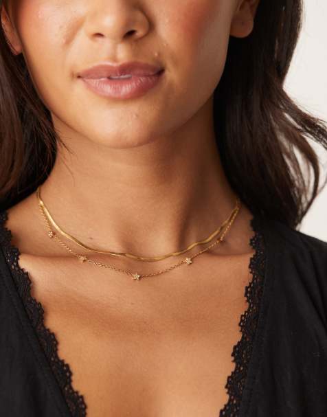 ASOS DESIGN - Collier en acier inoxydable étanche avec maille serpent plate et chaîne ornée de breloques étoiles - Doré - view 1