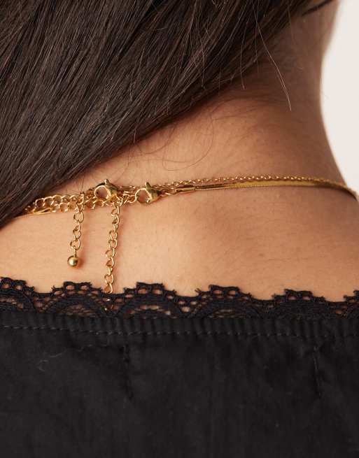 ASOS DESIGN - Collier en acier inoxydable étanche avec maille serpent plate et chaîne ornée de breloques étoiles - Doré, 3 de 3
