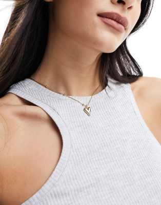 ASOS DESIGN - Collier en acier inoxydable imperméable avec pendentif cœur bombé et détails boules - Doré