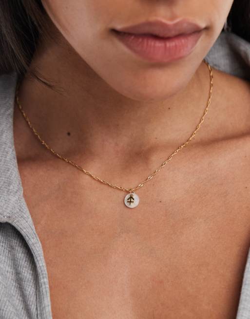 ASOS DESIGN - Collier en plaqué or 14 carats à pendentif disque en perle fantaisie et symbole signe astrologique Sagittaire avec pochette cadeau