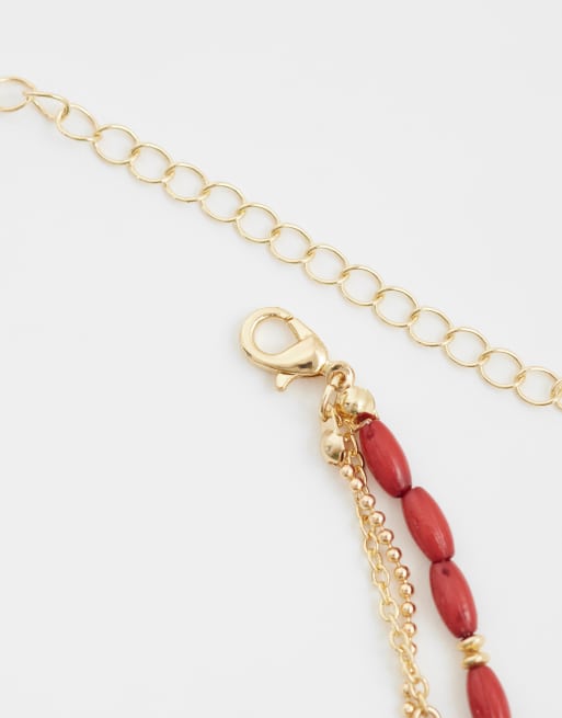 ASOS DESIGN - Collier multi-rangs à petites breloques poissons - Doré, 3 de 4