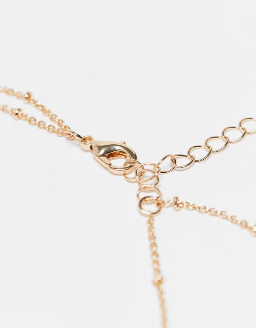 ASOS DESIGN - Collier multi-rangs avec chaîne et détails célestes - Doré, 3 de 3