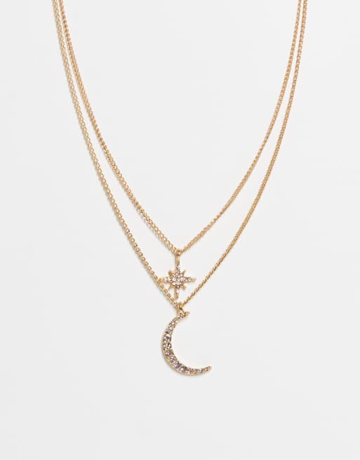 ASOS DESIGN - Collier multirangs à pendentifs étoile et lune - Doré