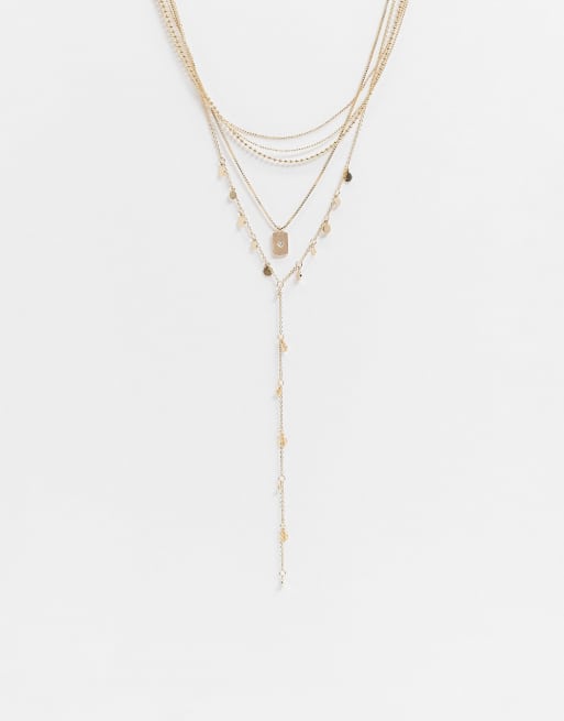 ASOS DESIGN - Collier multirangs style lasso avec disque avec pendentif étiquette étoile - Doré