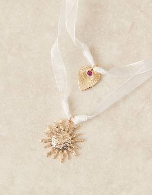 ASOS DESIGN - Collier ruban avec pendentif soleil - Doré