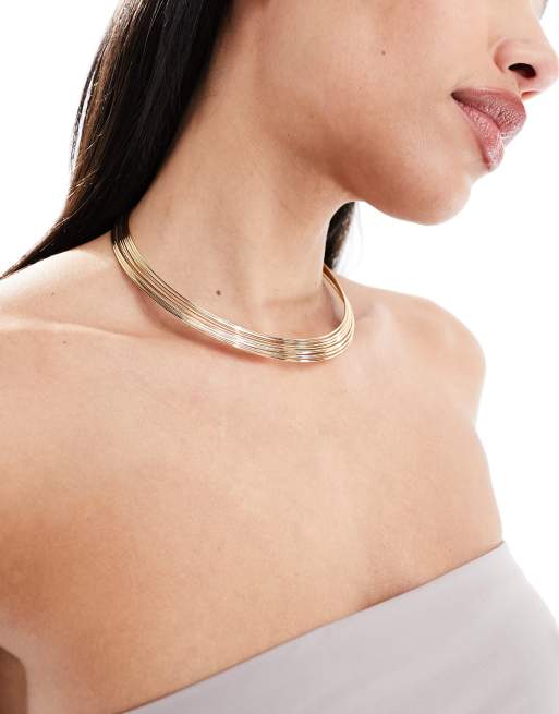 ASOS DESIGN - Collier torque ras de cou effet fils métallisés - Doré