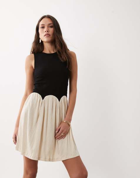 ASOS DESIGN colour block crinkle mini dress in black & cream - view 1