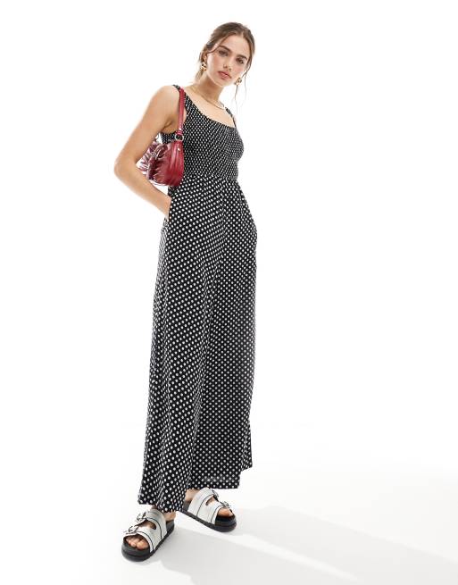 ASOS DESIGN - Combinaison ample à pois avec encolure échancrée - Noir et blanc