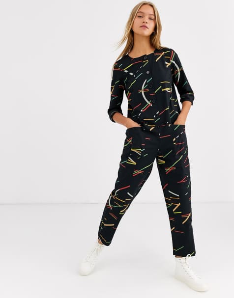 ASOS DESIGN - Combinaison belu de travail à manches longues et boutons sur l'avant avec imprimé géométrique - Multicolore