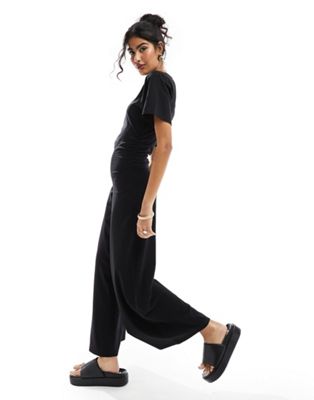 ASOS DESIGN ruched side jumpsuit with wide leg in black - ASOS Price Checker