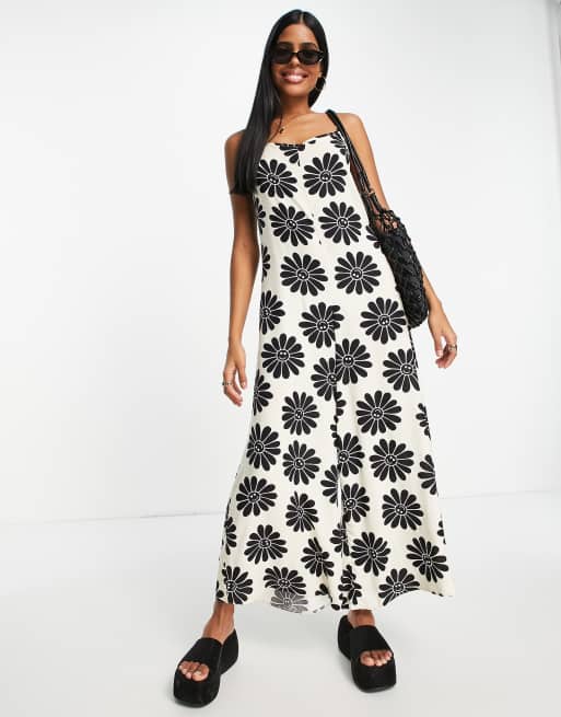 ASOS DESIGN - Combinaison nouée dans le dos à bretelles fines et imprimé fleuri oversize - Crème 