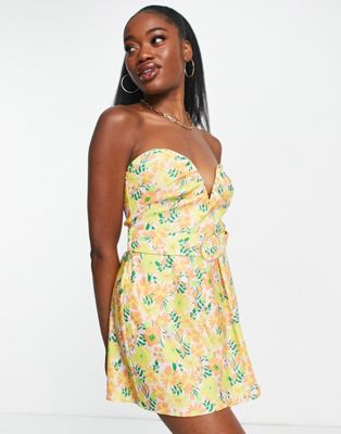 ASOS DESIGN ruched bandeau playsuit with belt in floral print - ASOS Price Checker