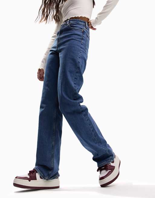 ASOS DESIGN comfort stretch straight leg jeans in mid blue