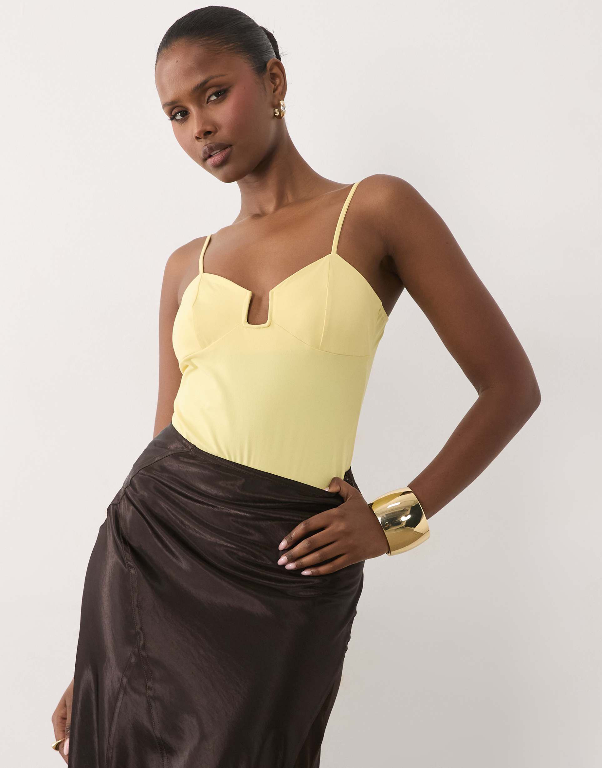 asos design compact cami bodysuit with wired plunge neck in buttermilk