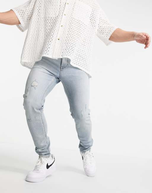 ASOS DESIGN – Cone Mill Denim – Eng geschnittene 'American Classic'-Jeans in heller Vintage-Waschung mit Rissen