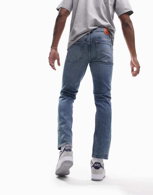 ASOS DESIGN - Cone Mill - Smalle denim 'American classic' jeans in getinte mid-wash blauw , 2 van 4